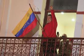 chavez_con_bandera_venezuela.jpeg